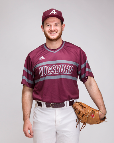 Donovan Tomony shows off the new baseball jerseys